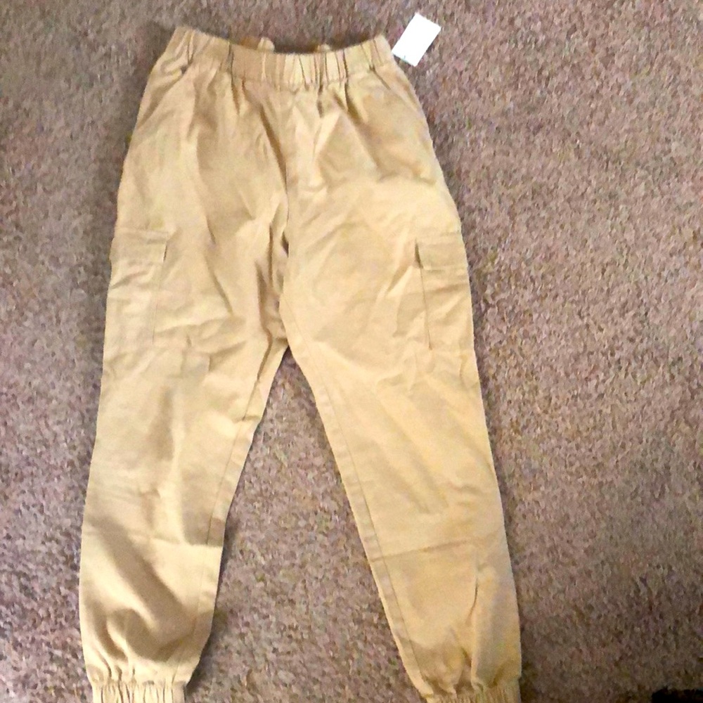 Brand new with tags . Khaki cargo jogger pants.